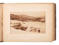 [WESTERN AMERICANA]. HAYNES, F. Jay (1853-1921), photographer. Album containing 24 photographs of Yellowstone National Park. St. Paul, MN.