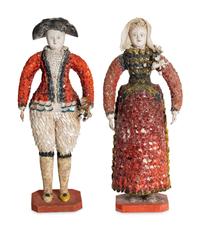 A Pair of French Carton Moule "Seaside" Dolls