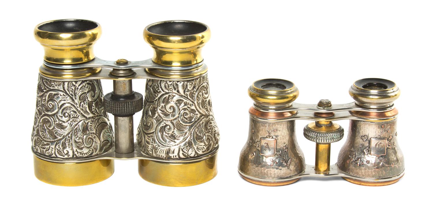 Two Pairs of Continental Silver or Silvered Metal Cased Opera Glasses, Width of first 4 1/2 inches.