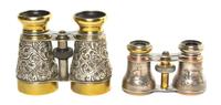 Two Pairs of Continental Silver or Silvered Metal Cased Opera Glasses, Width of first 4 1/2 inches.