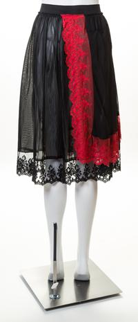 A Comme des Garcons Black Lingerie Skirt, Size small.