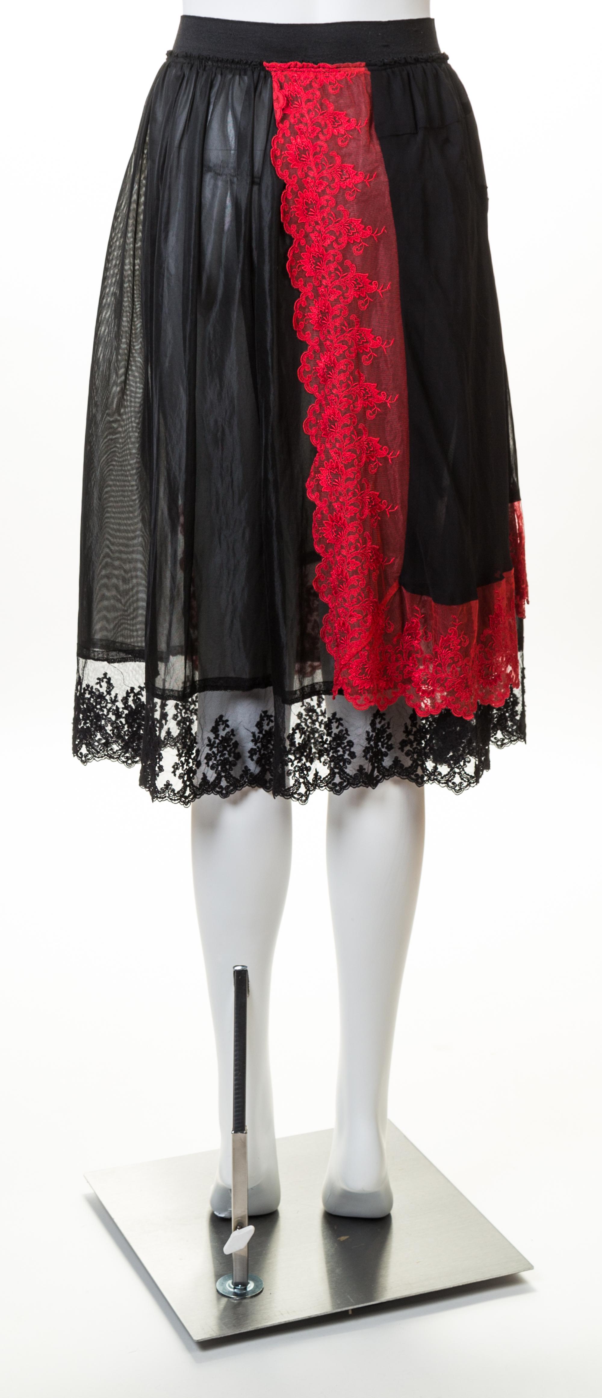 A Comme des Garcons Black Lingerie Skirt, Size small.