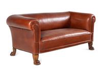 A Leather-Upholstered Mahogany Three-Piece Seating Suite