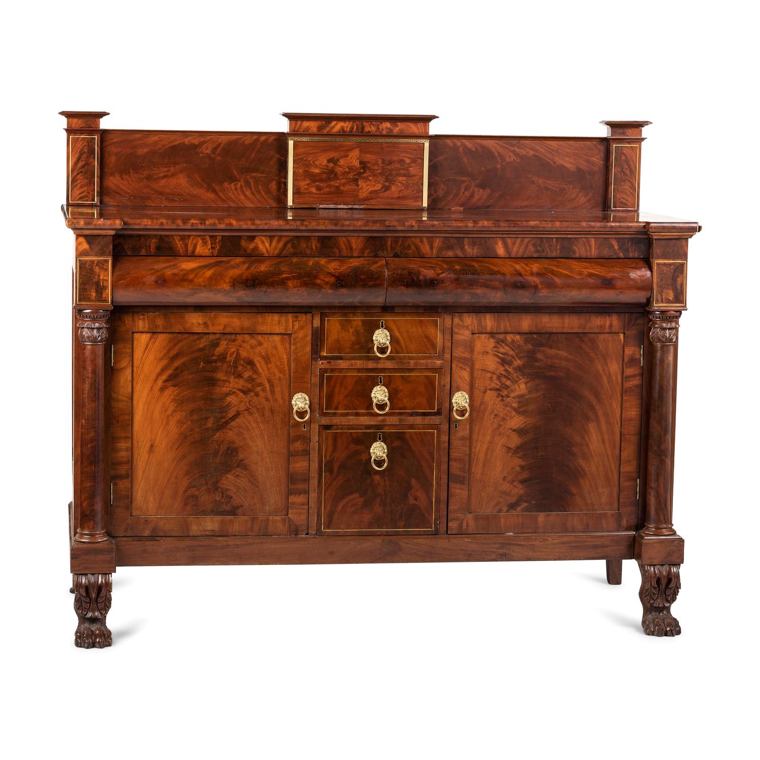 A Classical Brass Inlaid, Carved and Figured Mahogany Sideboard