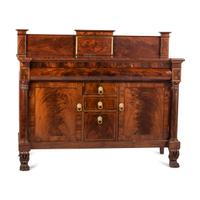 A Classical Brass Inlaid, Carved and Figured Mahogany Sideboard