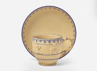 A Wedgwood Encaustic Decorated Caneware "Bacchanalian Boys" Cup and Saucer, UK, circa 1790