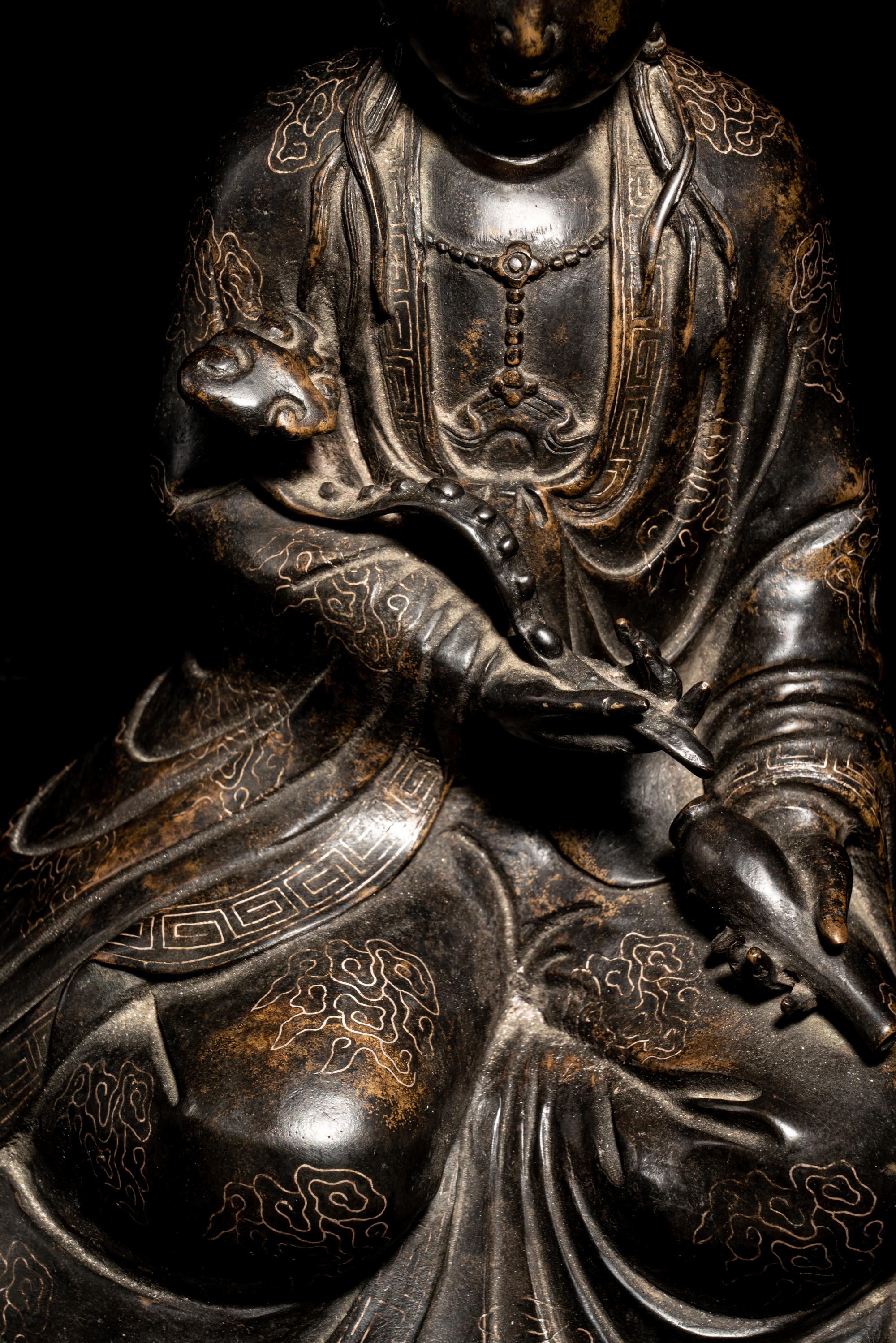 A Silver Wire Inlaid Bronze Figure of Guanyin