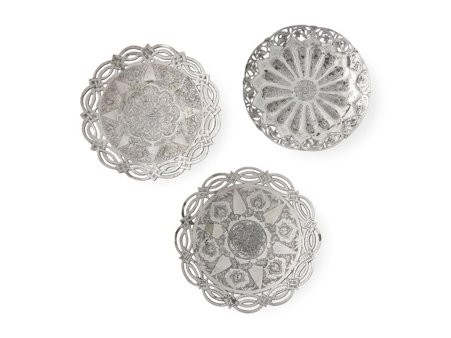 A Group of Eight Persian Silver Table Articles