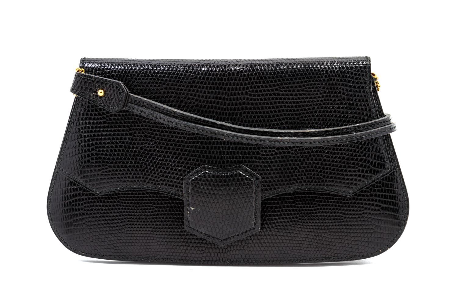 An Hermes Black Lizardskin Shoulder Bag, 9 x 5 1/2 x 1 inches.