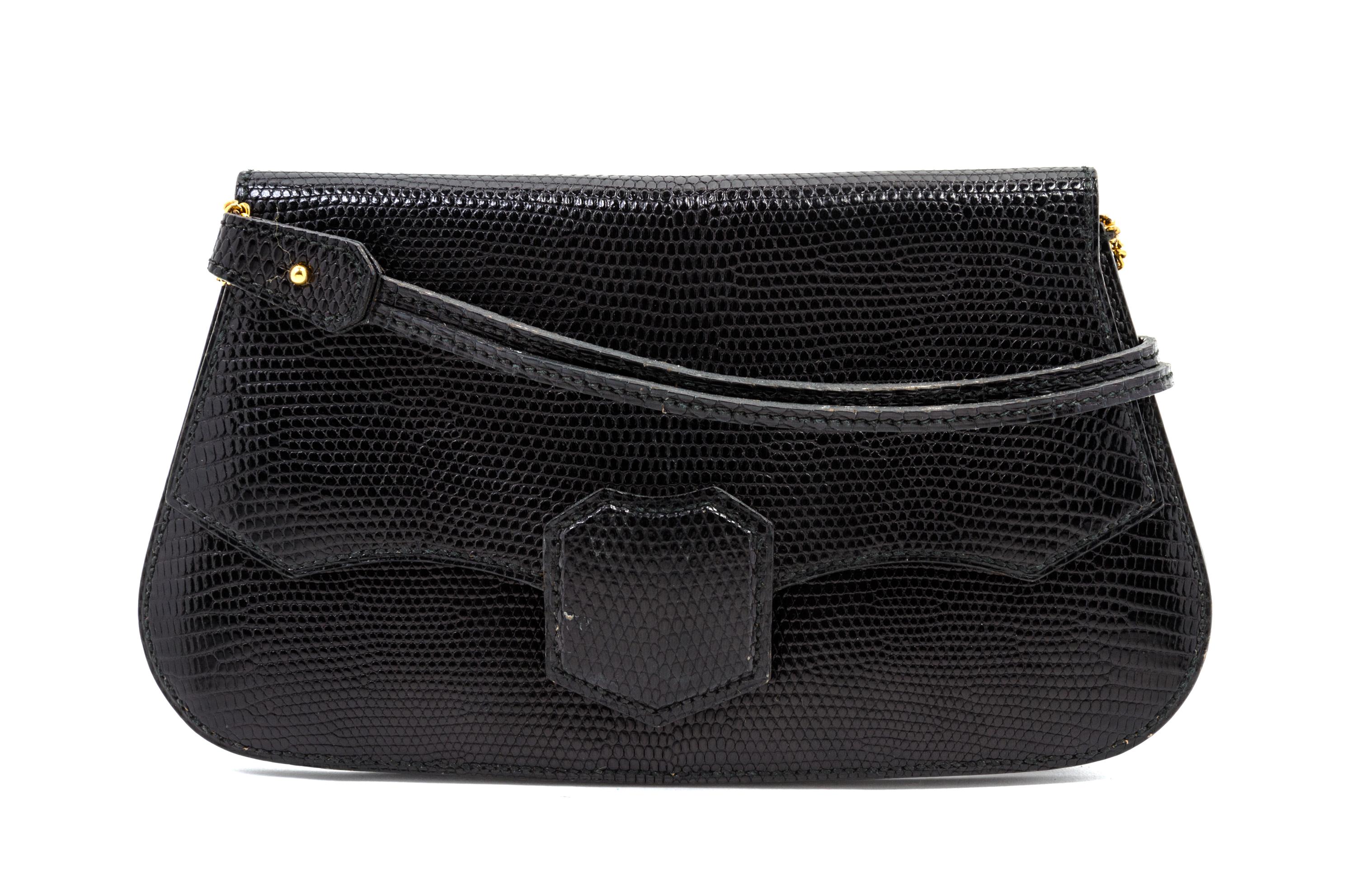 An Hermes Black Lizardskin Shoulder Bag, 9 x 5 1/2 x 1 inches.
