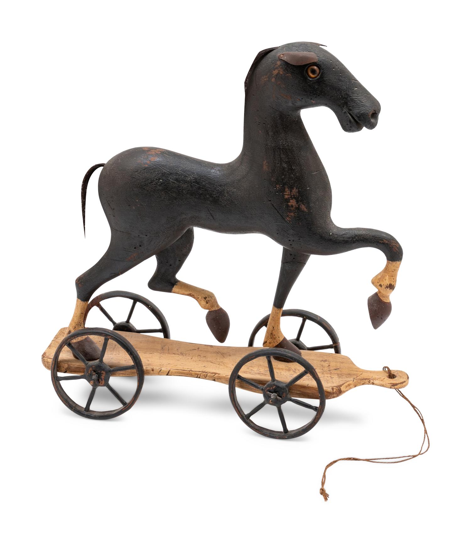 A Carved Folk Art Pull Toy