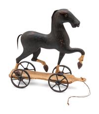 A Carved Folk Art Pull Toy