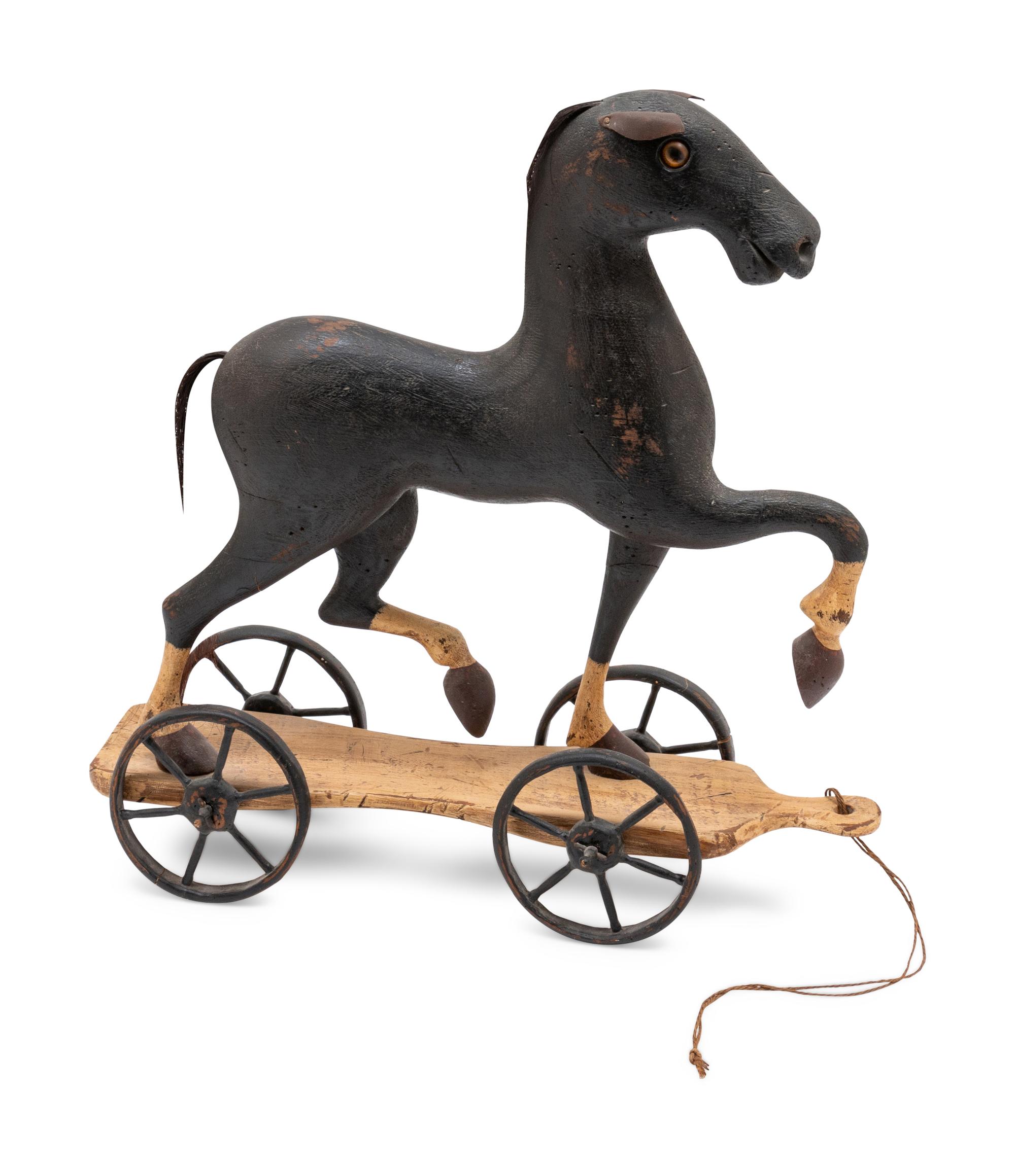 A Carved Folk Art Pull Toy