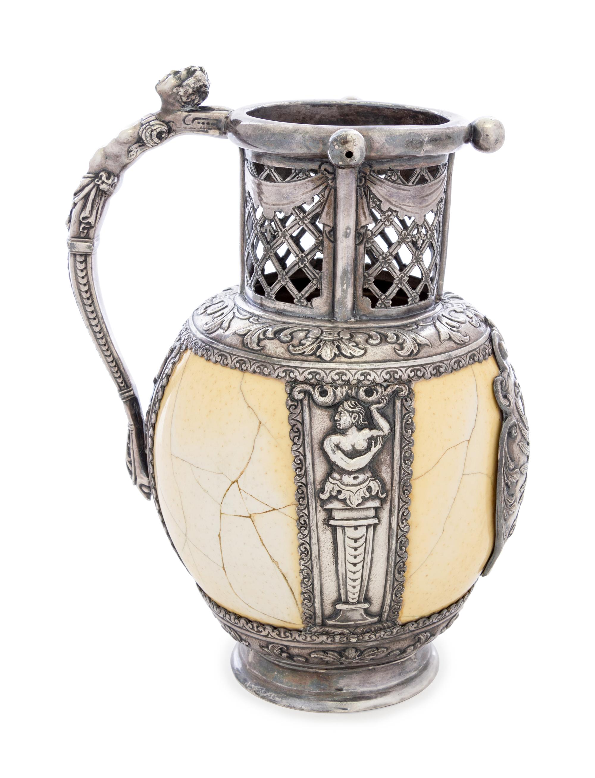 An Austrian Silver Mounted Ostrich Egg Puzzle Jug
