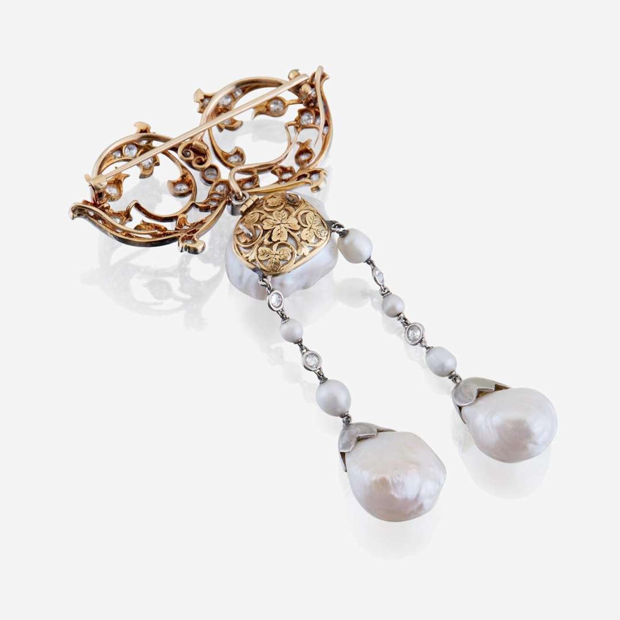 A natural pearl, diamond, eighteen karat gold, and platinum brooch