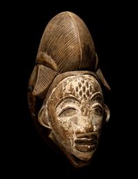 Four Punu Wood Masks