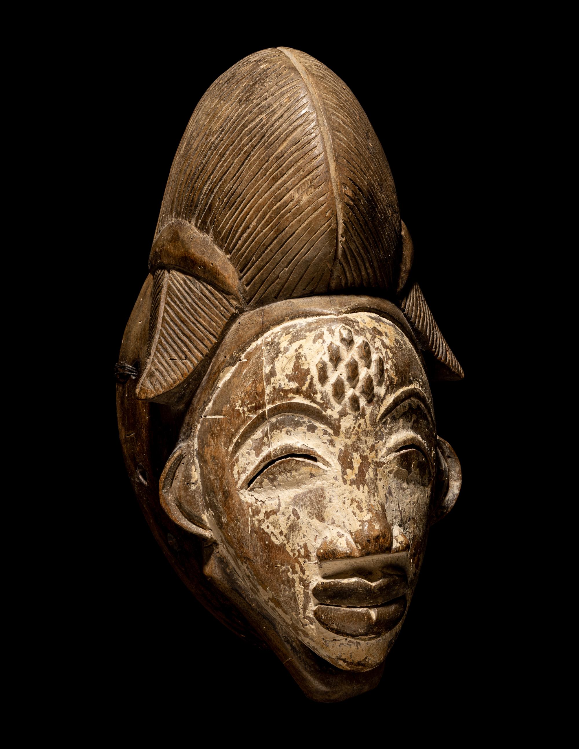 Four Punu Wood Masks