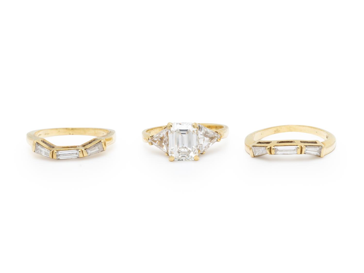 DIAMOND AND YELLOW GOLD RING WITH TWO GUARD RINGS