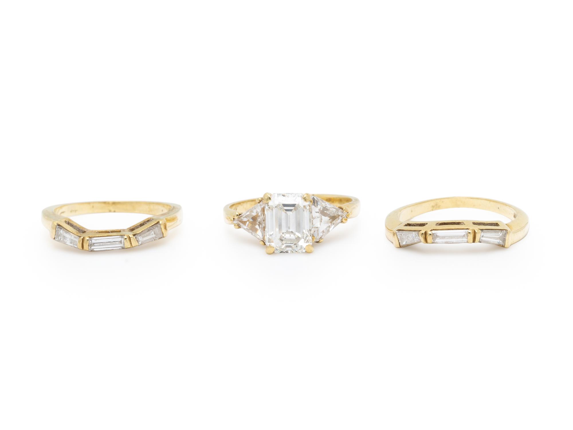 DIAMOND AND YELLOW GOLD RING WITH TWO GUARD RINGS