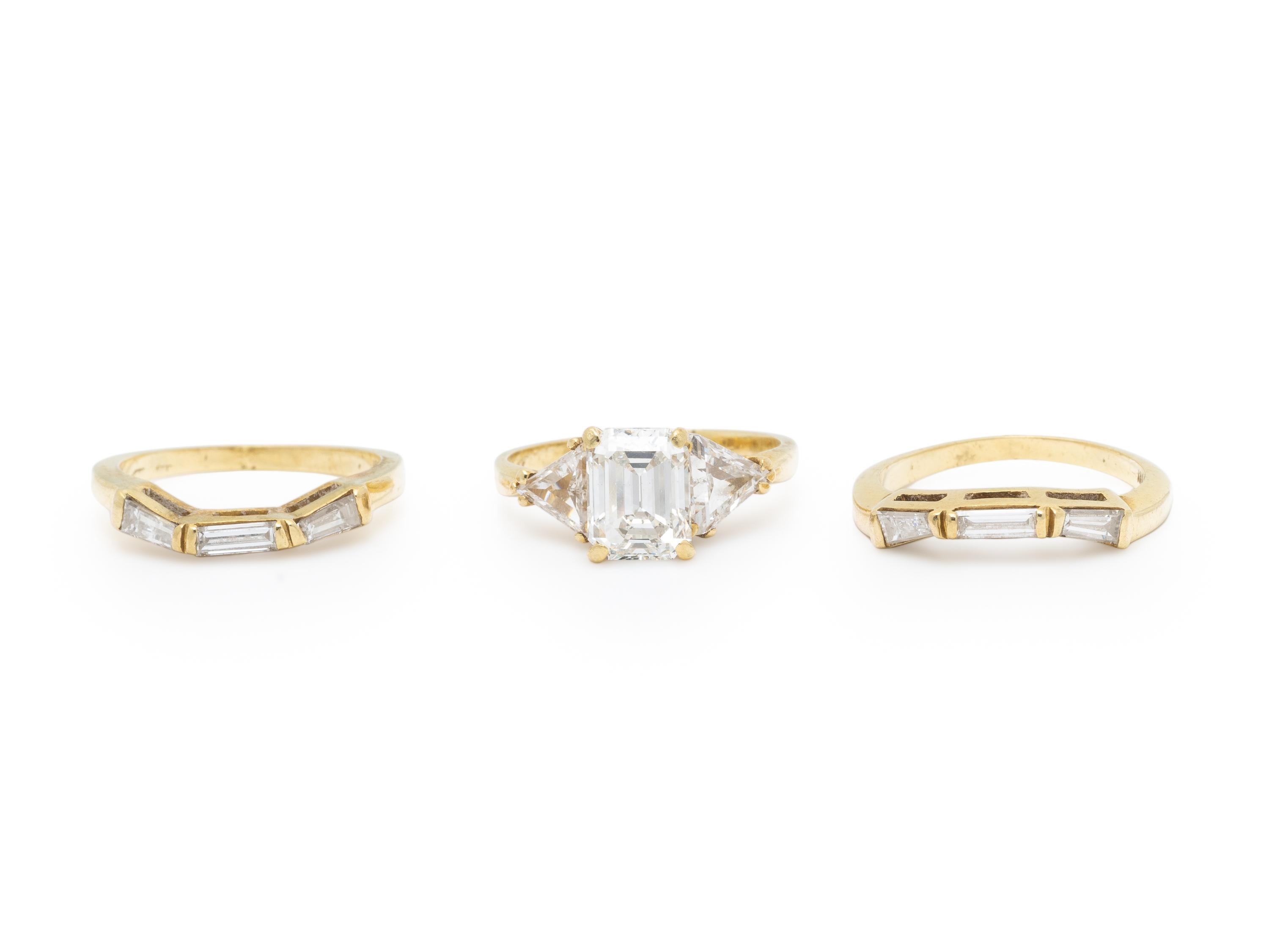 DIAMOND AND YELLOW GOLD RING WITH TWO GUARD RINGS