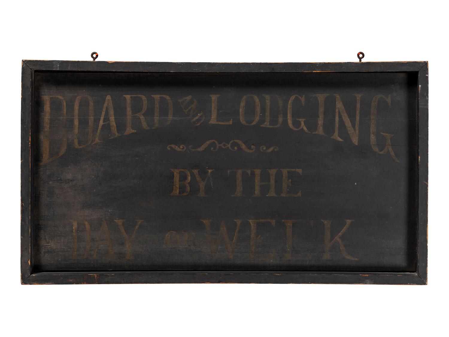 A Painted Wood Board and Lodging Sign
