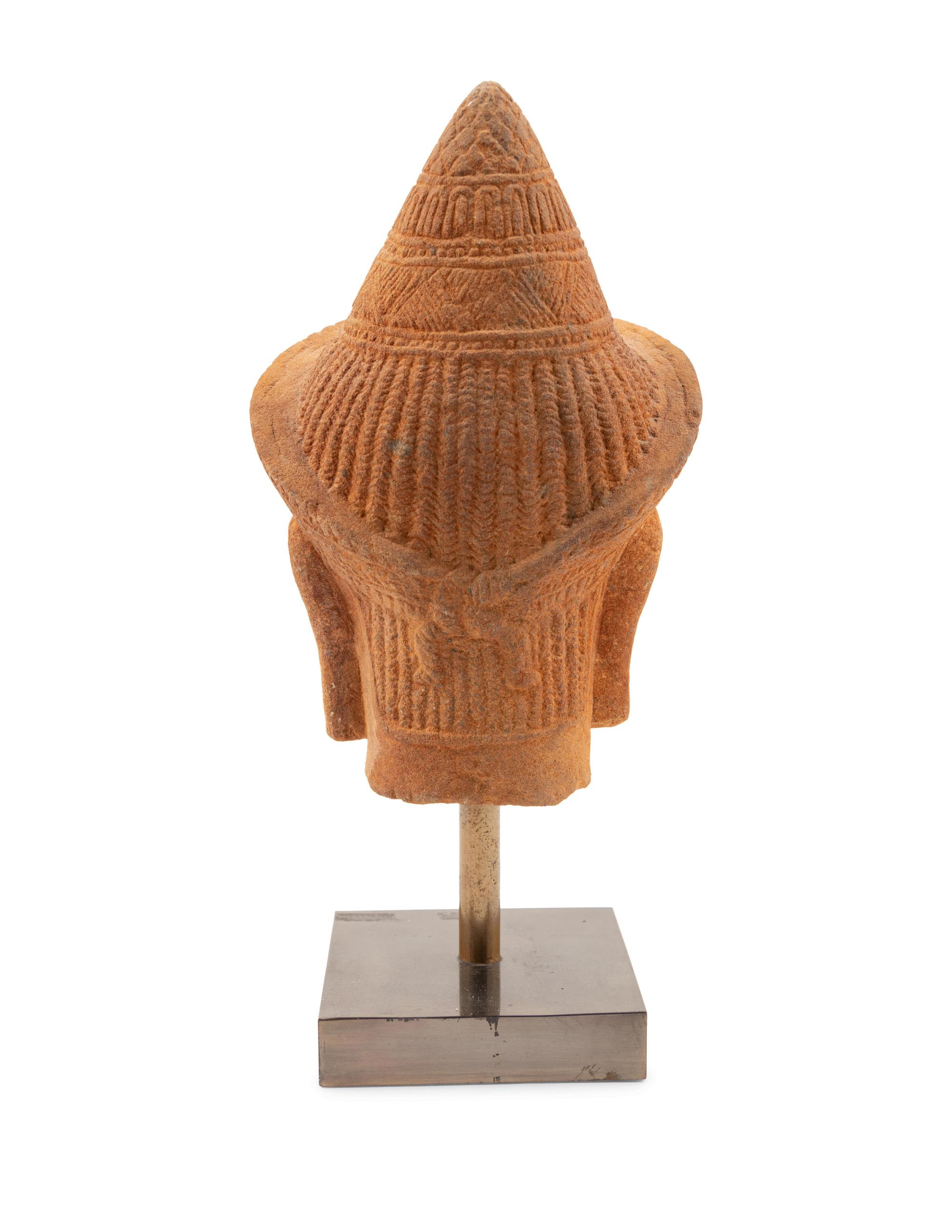 A Cambodian Sandstone Head of a Deity