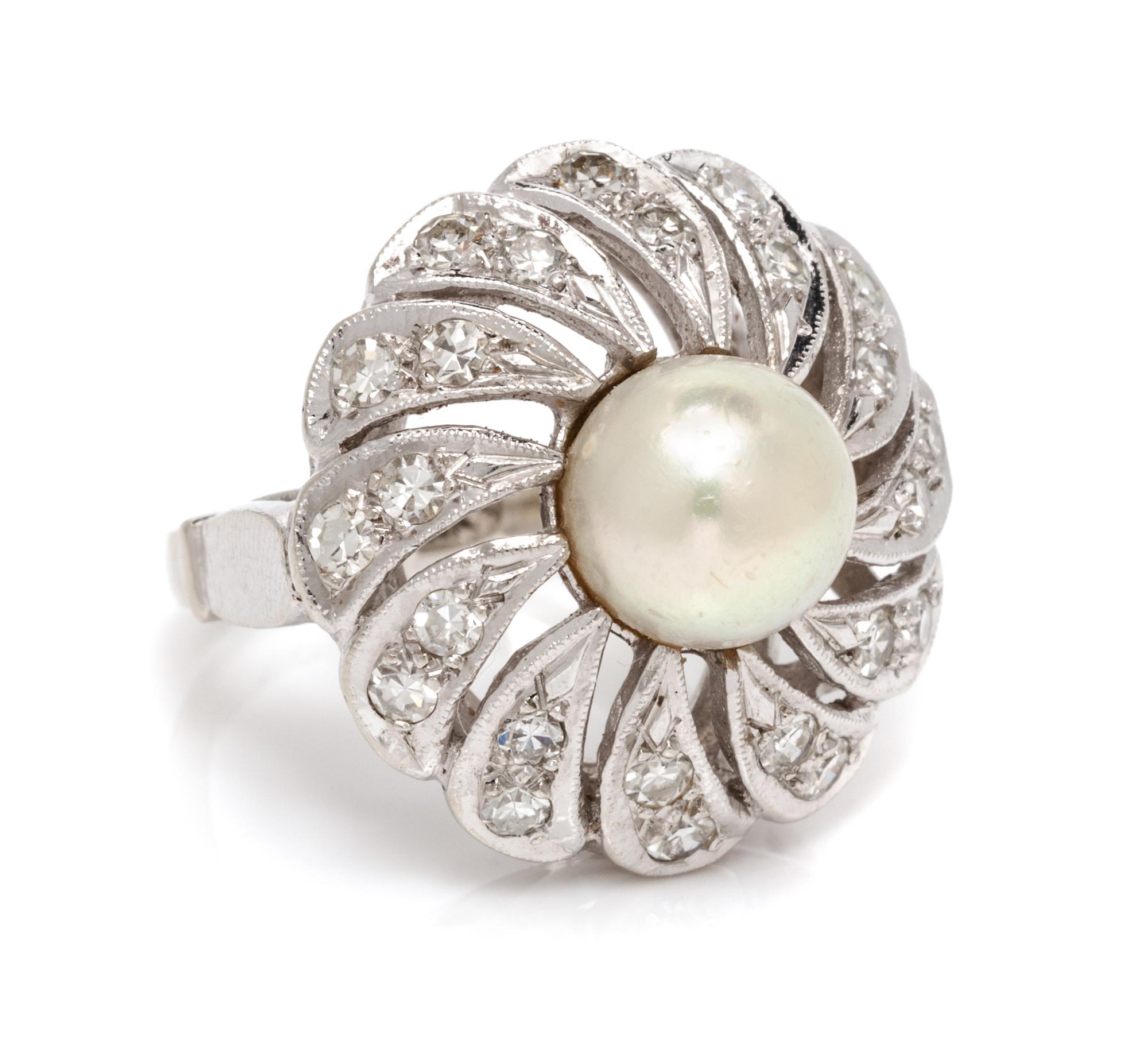 A 14 Karat White Gold, Cultured Pearl and Diamond Ring, 6.20 dwts.