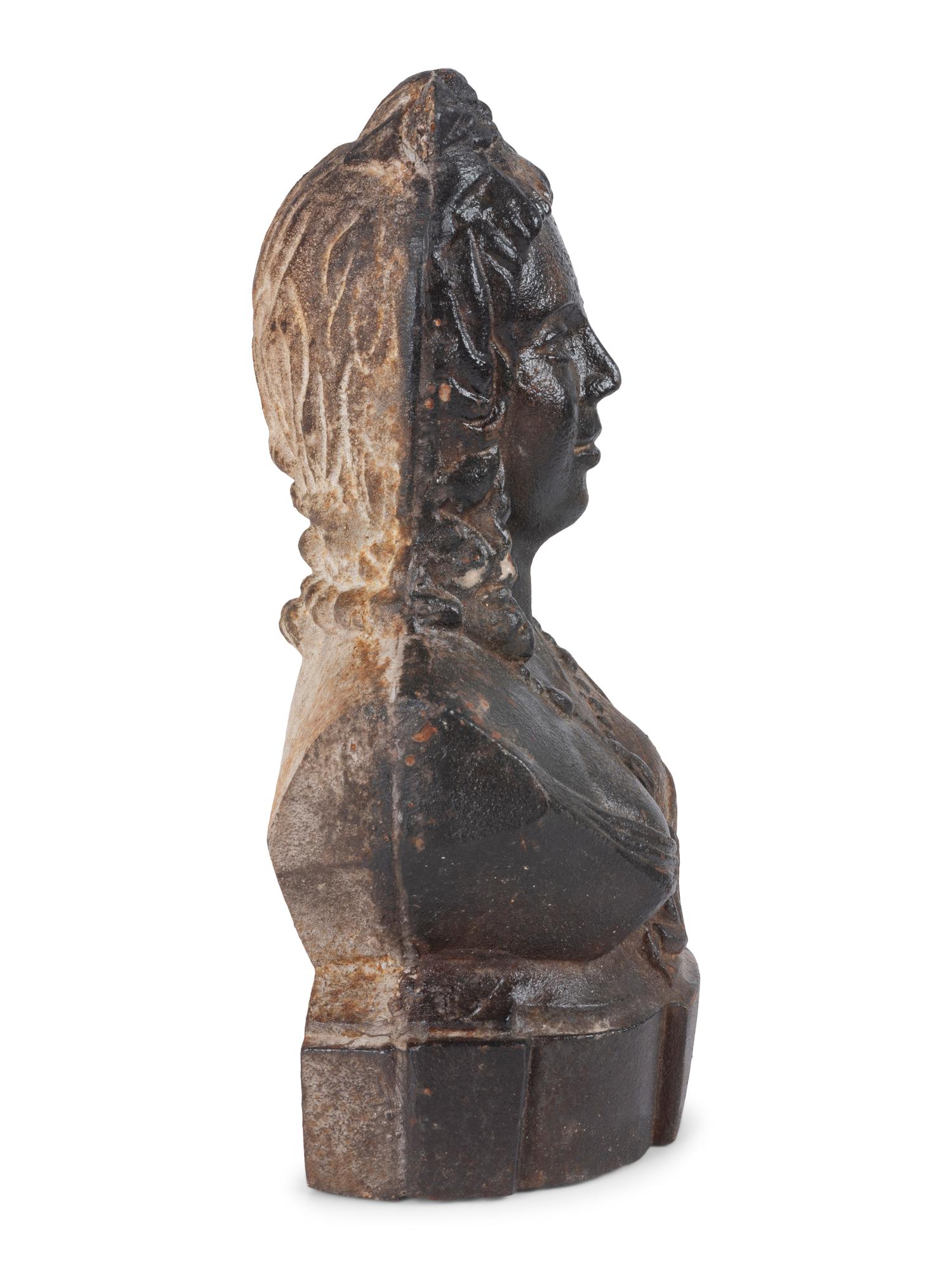 A Cast Iron Maiden-Form Door Stop