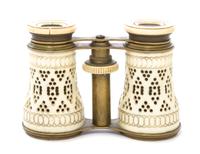A Pair of French Bone Veneered Opera Glasses, Width 4 1/4 inches.
