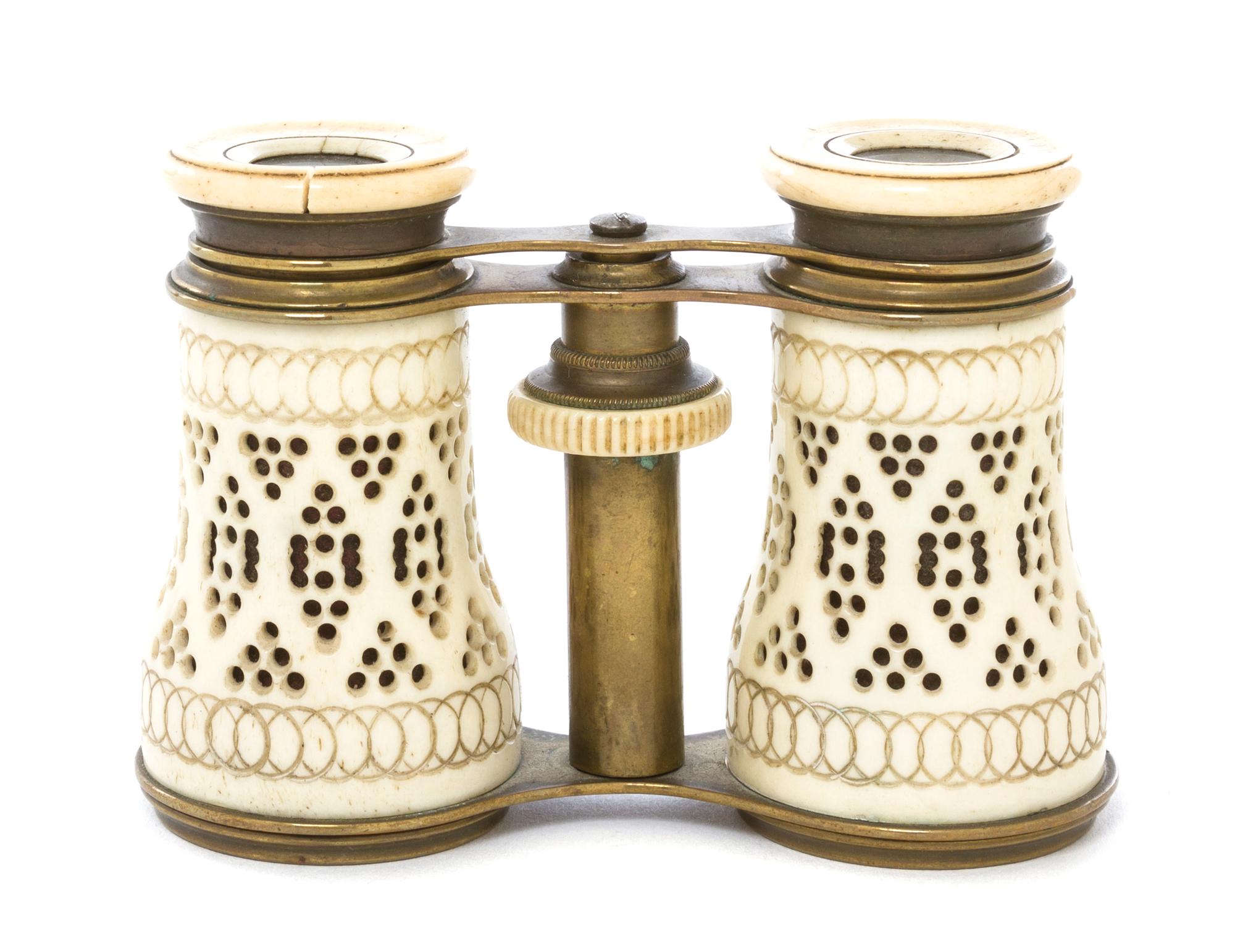 A Pair of French Bone Veneered Opera Glasses, Width 4 1/4 inches.