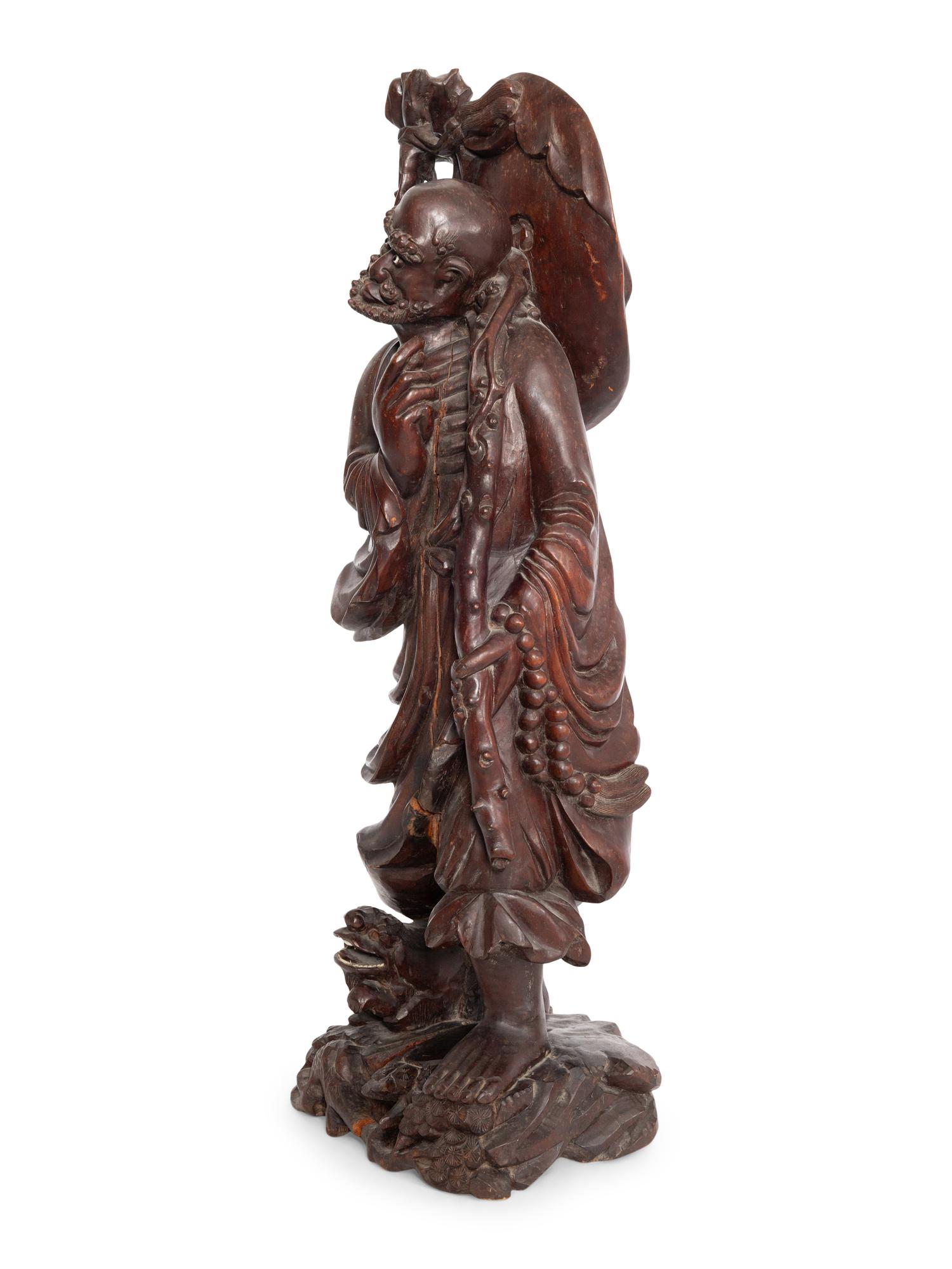 A Large Chinese Daruma Carving