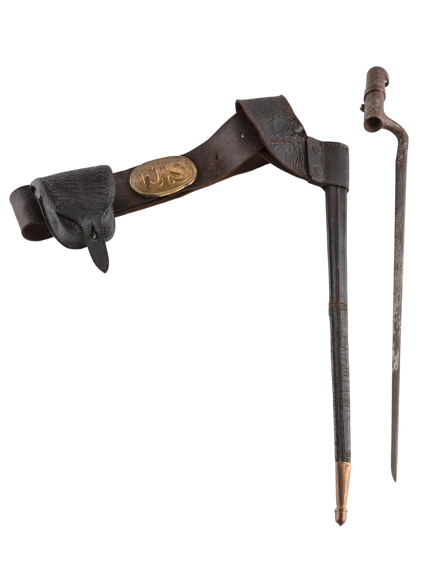 [CIVIL WAR]. A collection of items attributed to Thomas W. Johnson, Co. K, 4th Delaware Infantry, incl. frock coat, cap, belt rig, and cartridge box.
