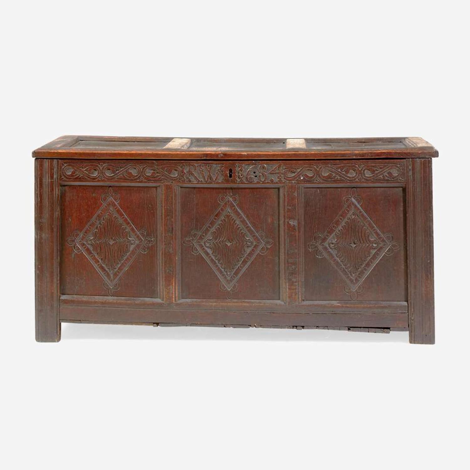A James II carved oak coffer, dated "1684"