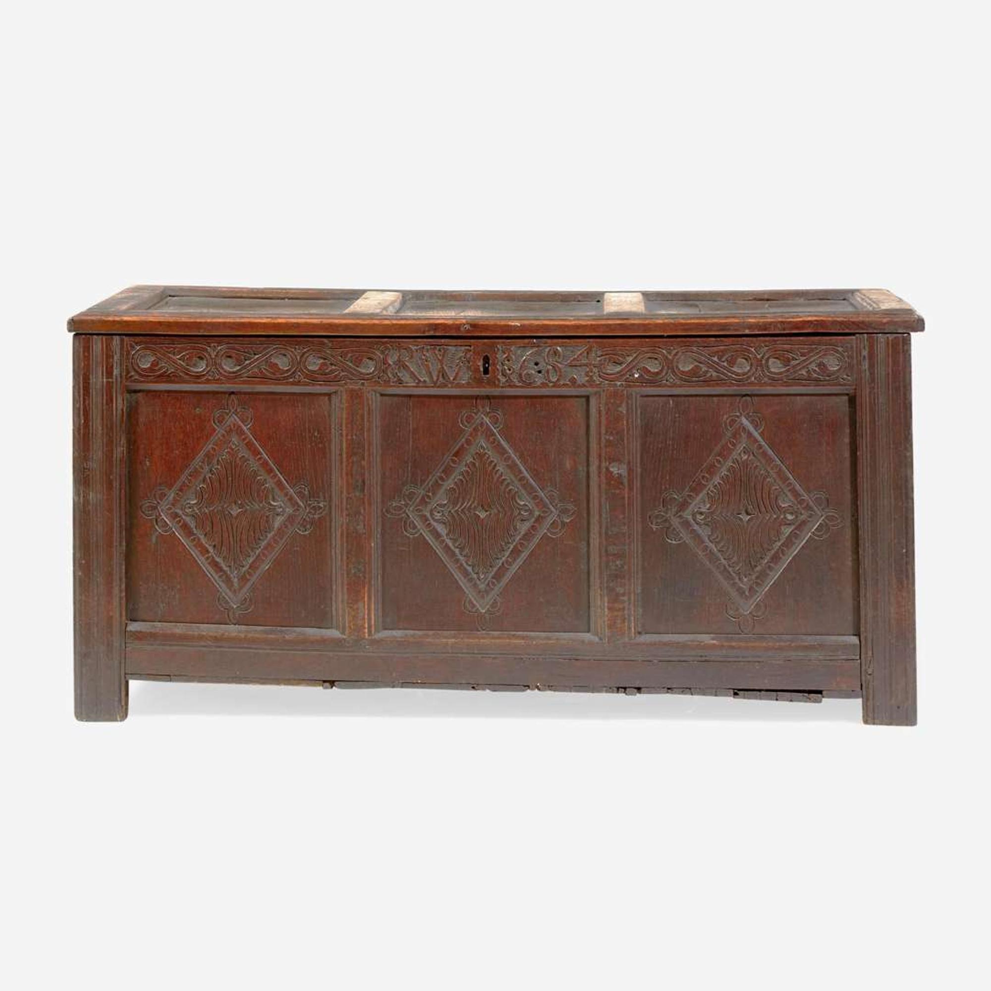 A James II carved oak coffer, dated "1684"