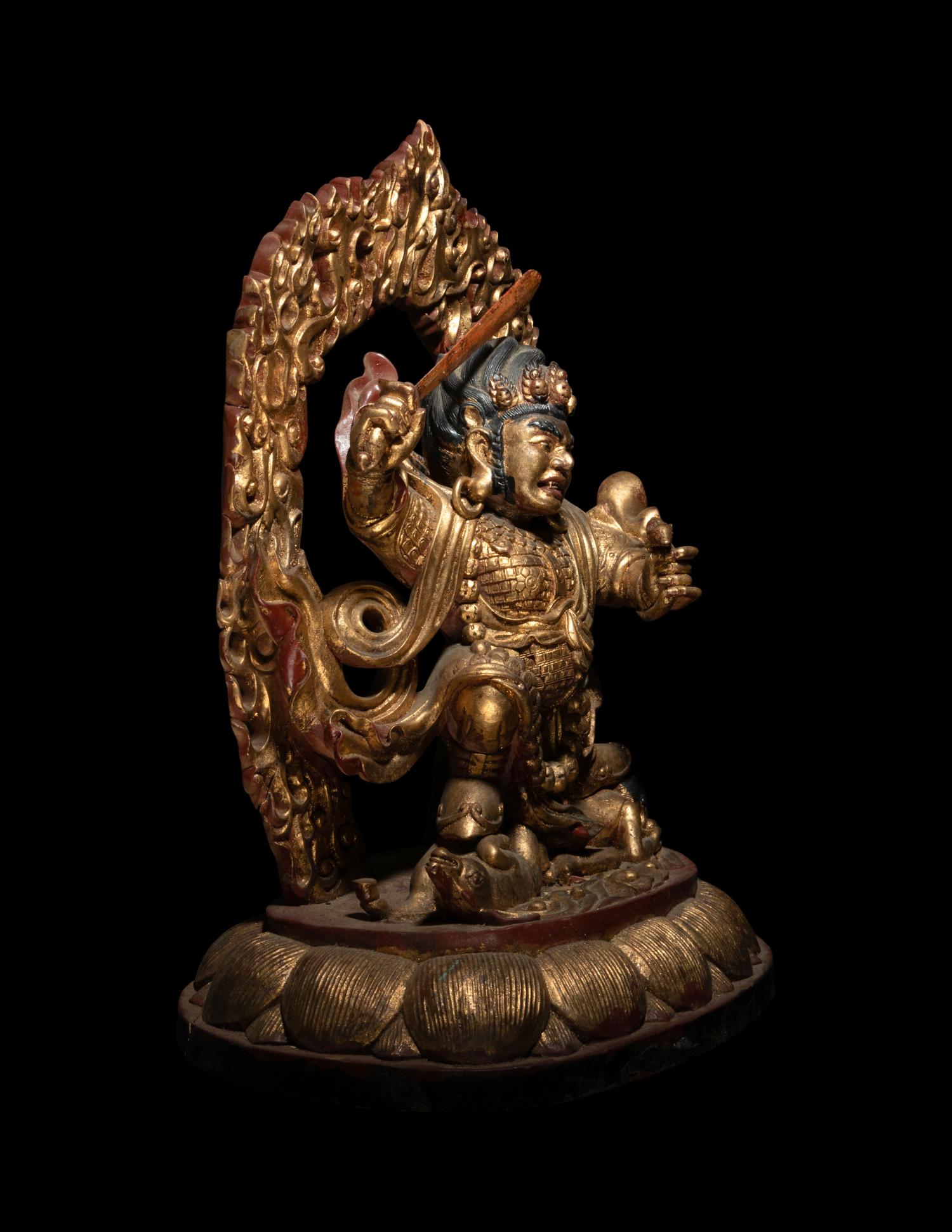 A Large Sino-Tibetan Gilt and Polychrome Lacquered Carved Wood Figure of a Dharmapala