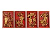 A Set of Four Chinese Gilt and Red Lacquered Wood 'Four Seasons' Panels