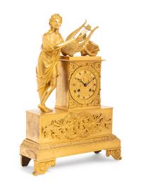 An Empire Gilt Bronze Figural Mantel Clock