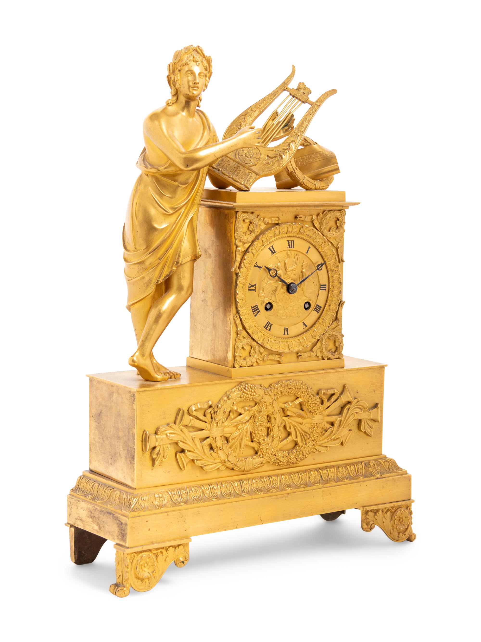 An Empire Gilt Bronze Figural Mantel Clock
