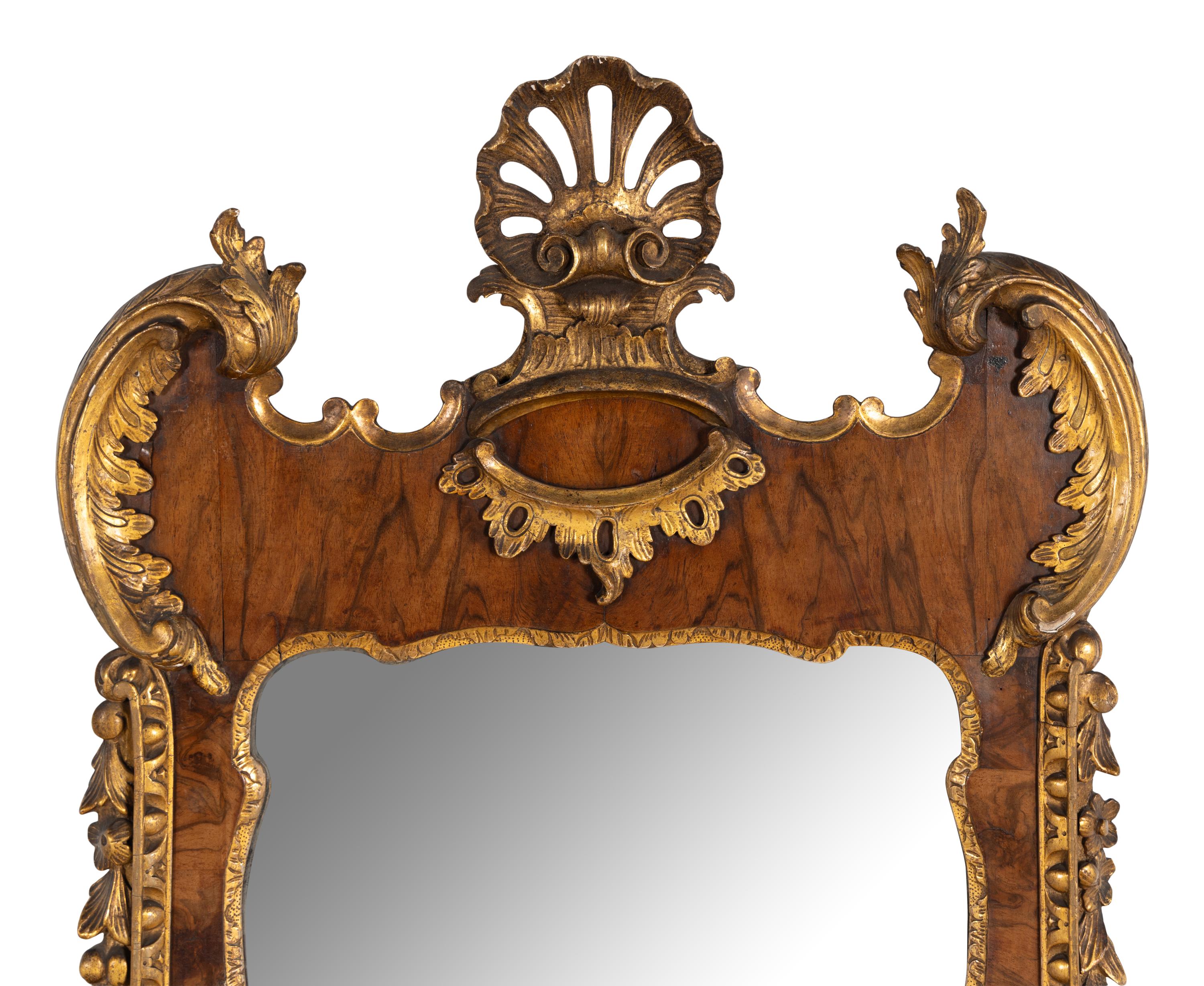 A George II Walnut and Parcel-Gilt Mirror