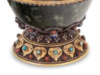 A Tibetan or Himalayan Hardstone Mounted Silver Teapot