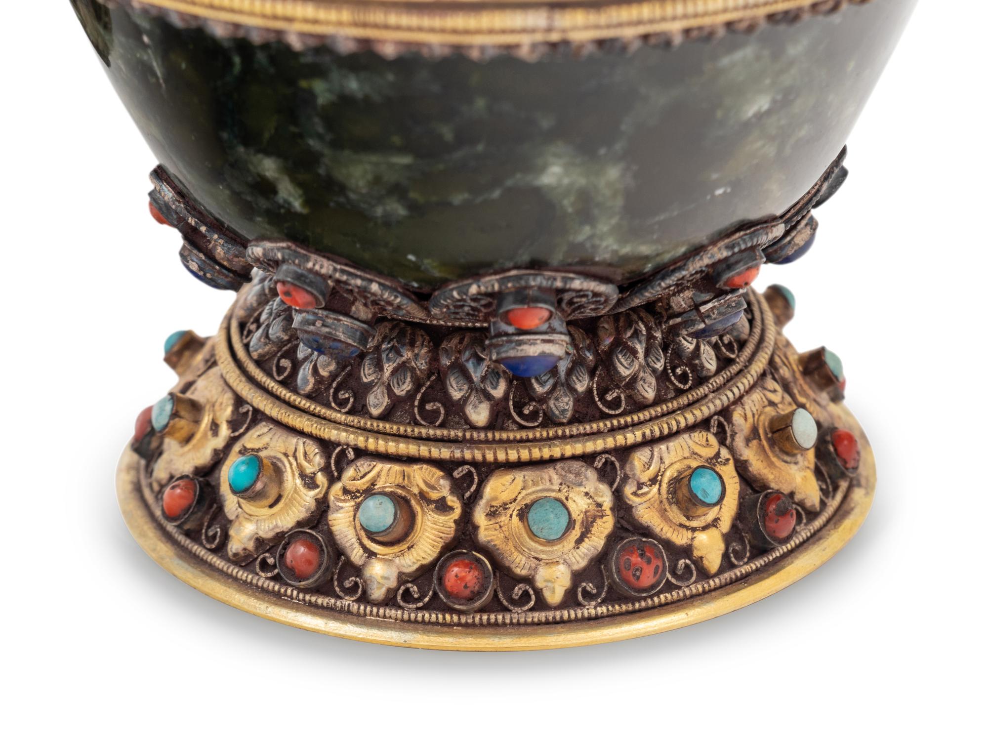 A Tibetan or Himalayan Hardstone Mounted Silver Teapot