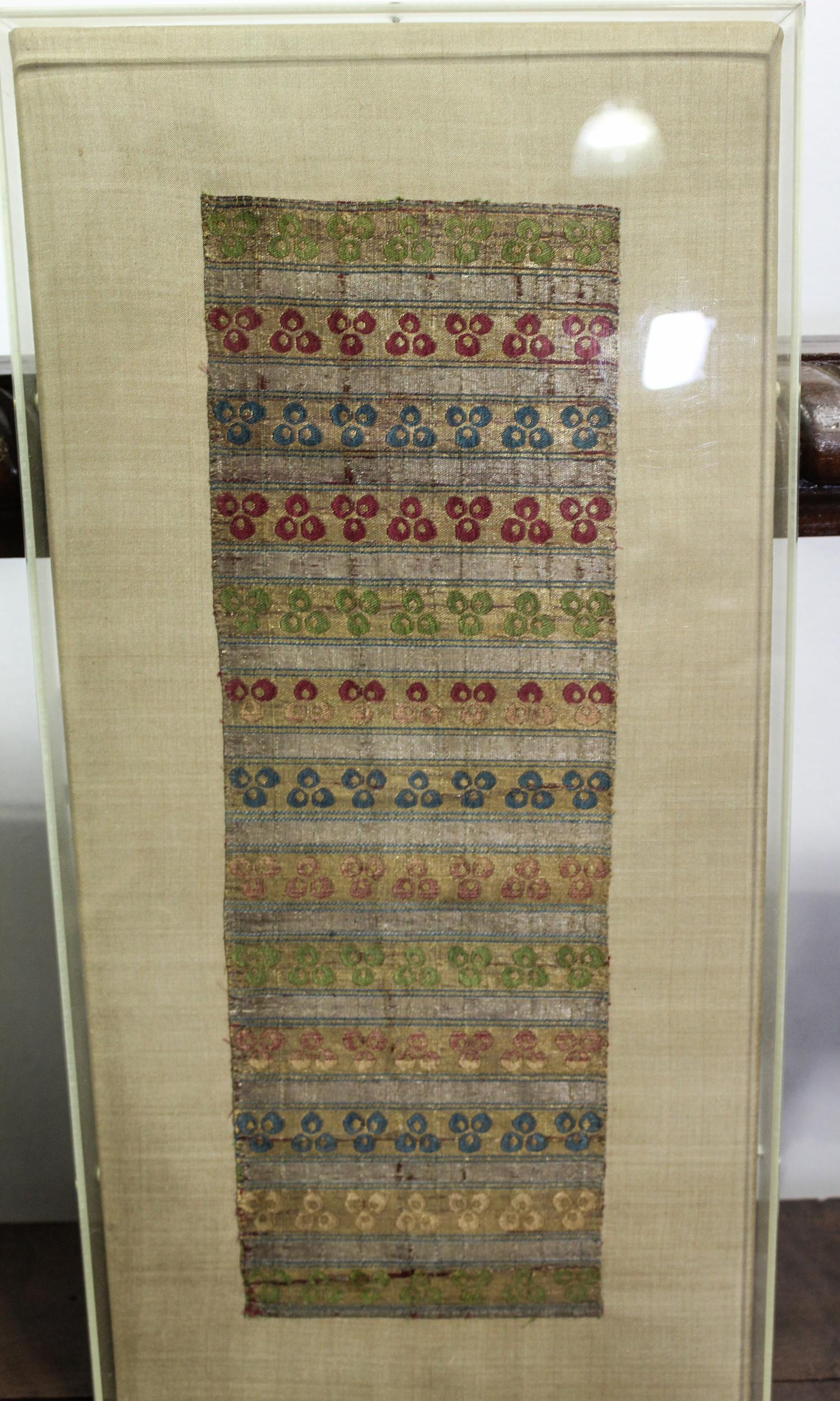A Kuba Cloth Length 16 1/2 x width 5 1/2 inches.