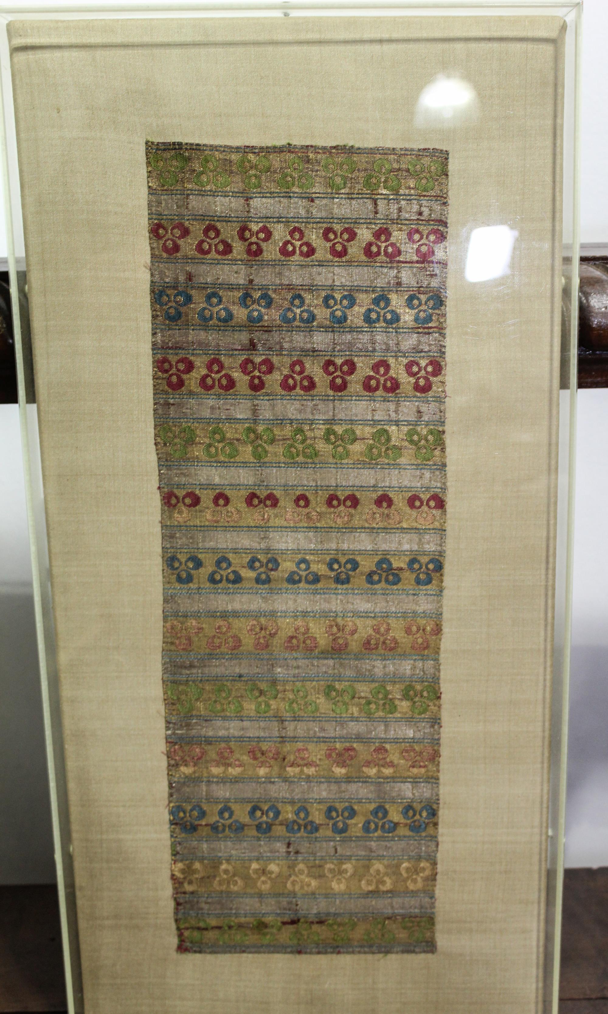 A Kuba Cloth Length 16 1/2 x width 5 1/2 inches.