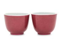 A Pair of Chinese Ruby Red Glazed Porcelain Cups, Jiaqing Period 清嘉慶 胭脂紅釉杯一對