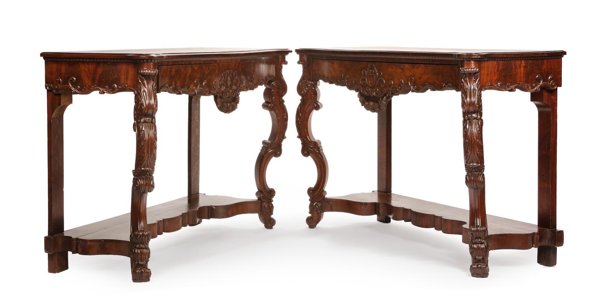 A Pair of Victorian Carved Mahogany Console Tables Height 40 3/4 x width 63 1/8 x depth 23 1/4 inches. — 19TH CENTURY