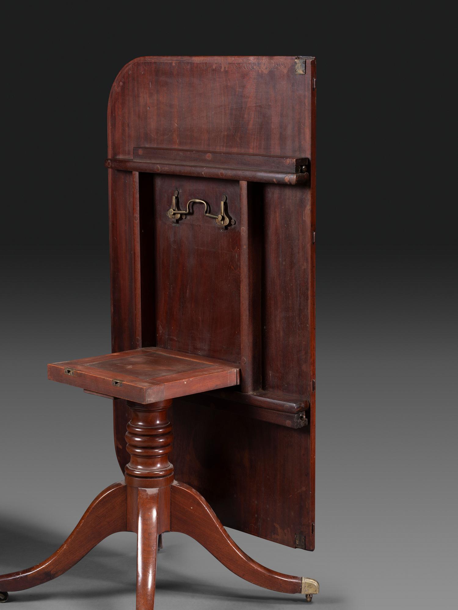 A Federal Mahogany Double Pedestal Extension Dining Table