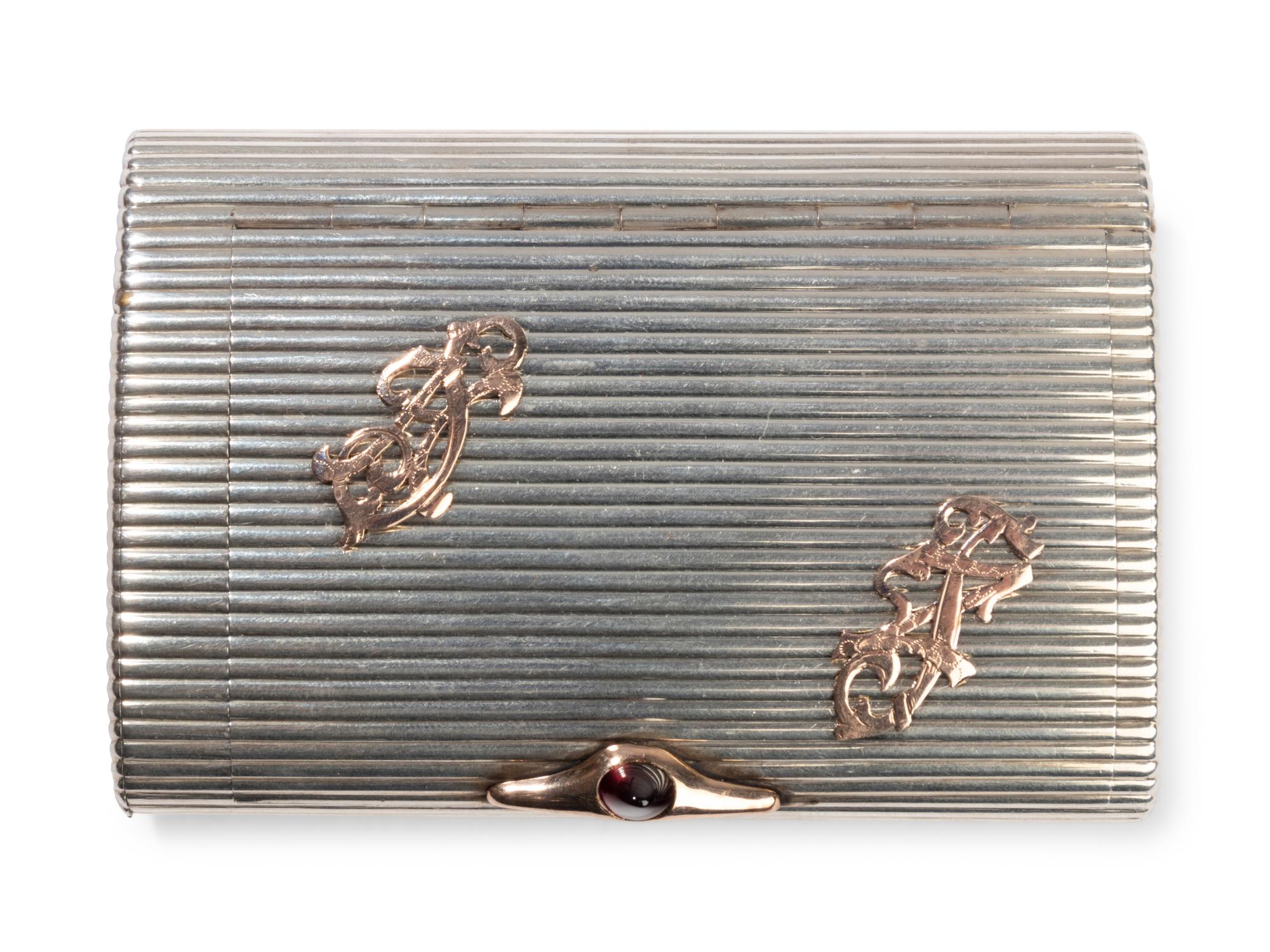 A Russian Silver, Gold and Charm Applied Cigarette Case