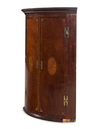 A George III Mahogany Corner Cabinet