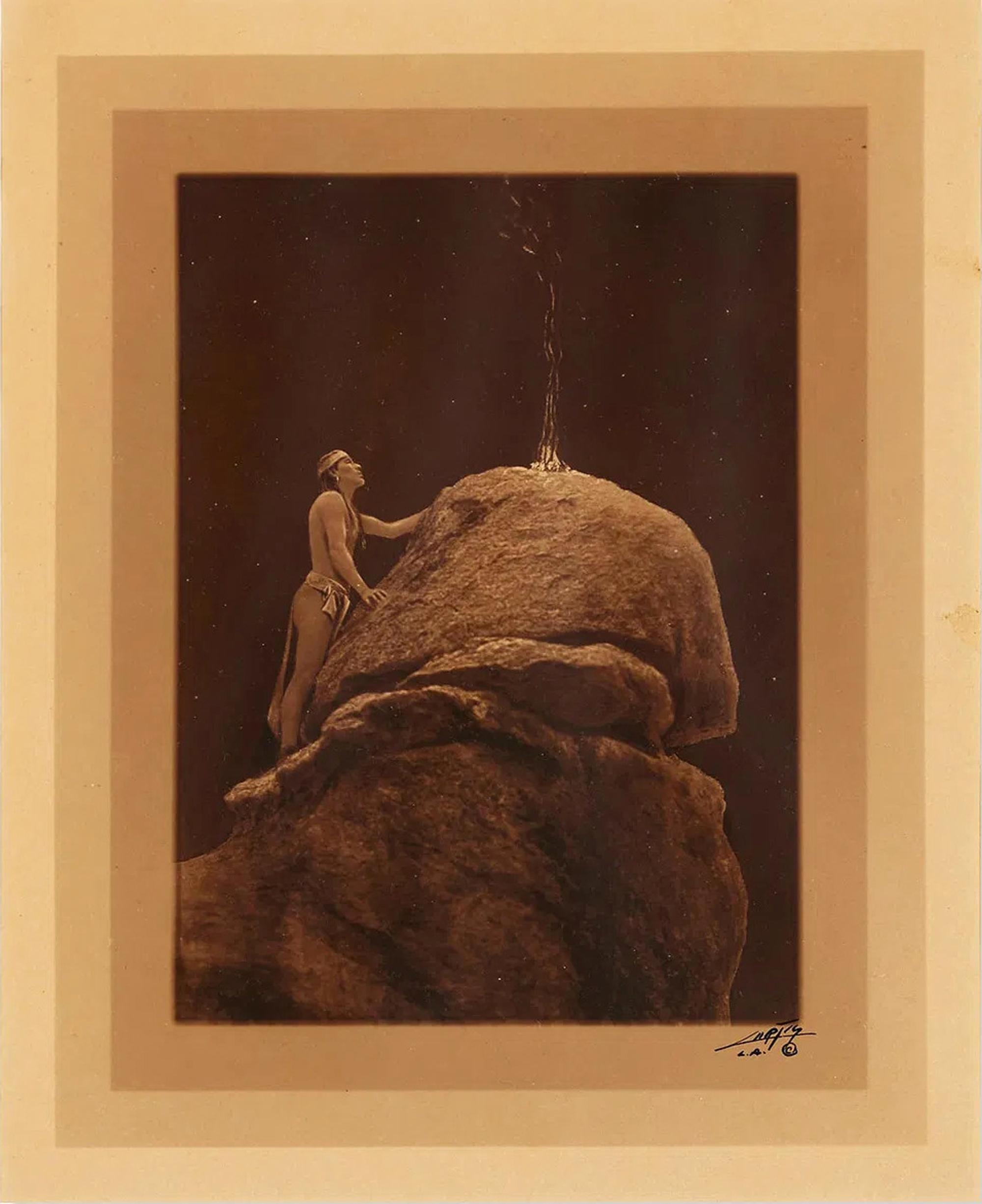 Curtis, Edward S. (1868-1952). Signal Fire to the Mountain Gods . 1909.