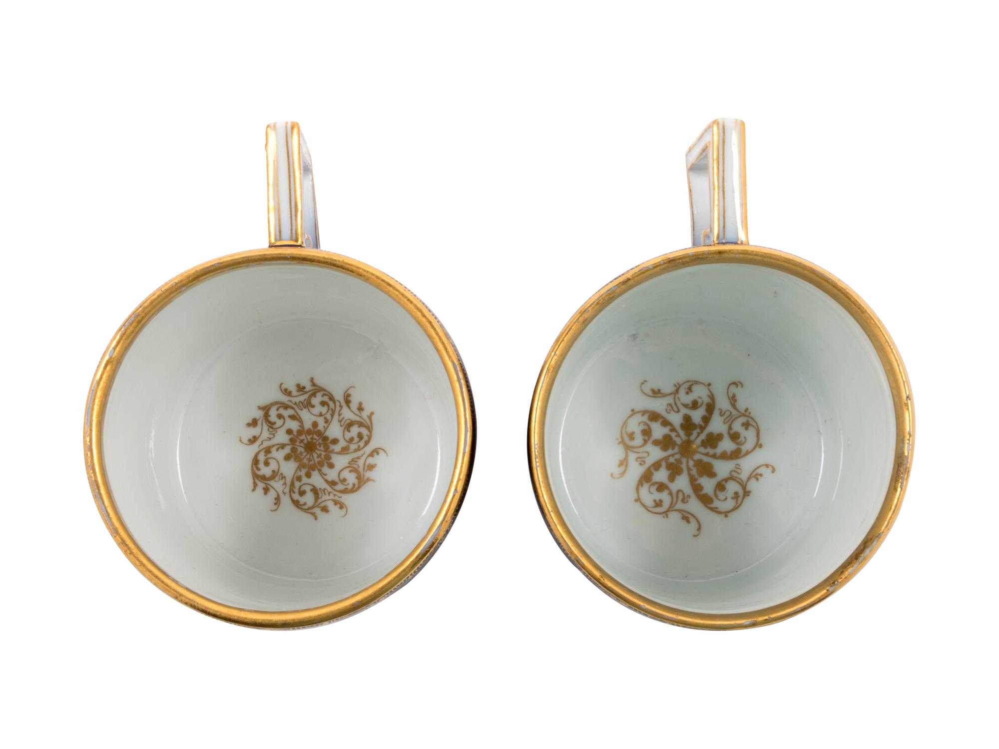 Two Meissen Painted and Parcel Gilt Porcelain Coffee Canns